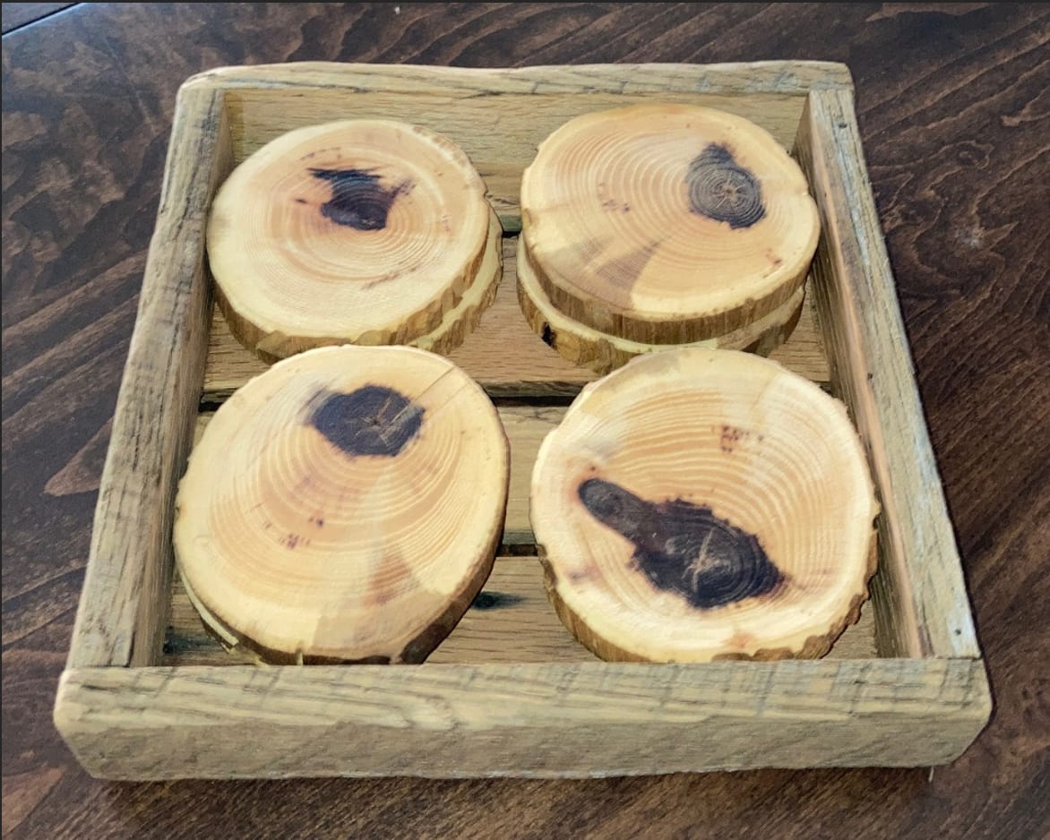 8 Coasters in a short wooden crate 8” square